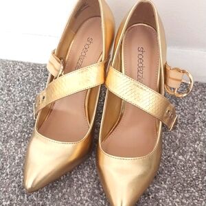Gold never worn mary jane heels